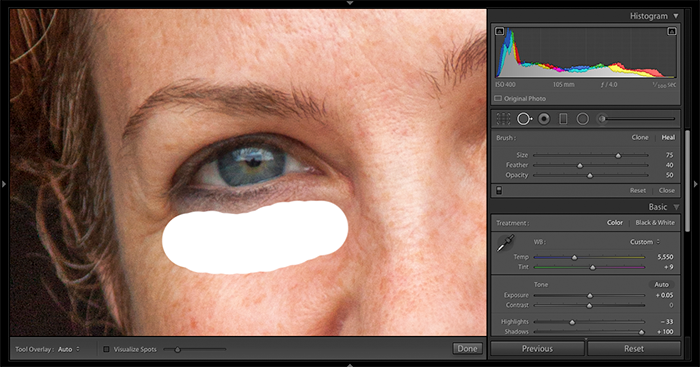 Скриншот использования инструмента Spot Removal Tool для ретуширования мешков под глазами в Lightroom