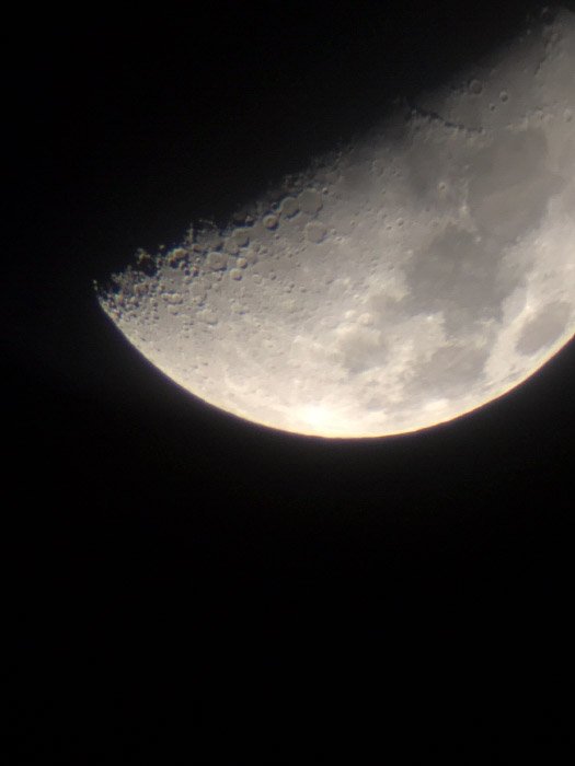 Unedited moon photography close up captured with iPhone 5 on the telescope