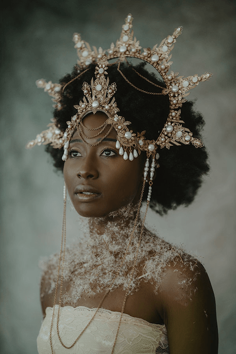 fine art portrait photography of the woman in the headdress and fancy dress