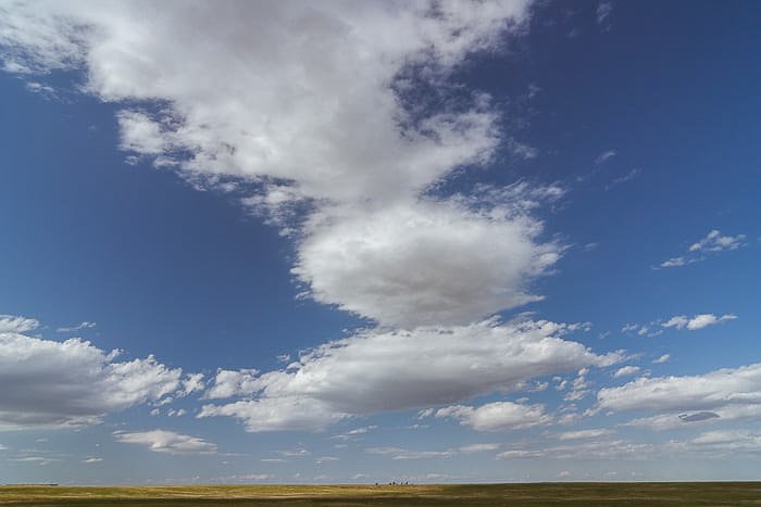 Cloudy skies over an American landscape