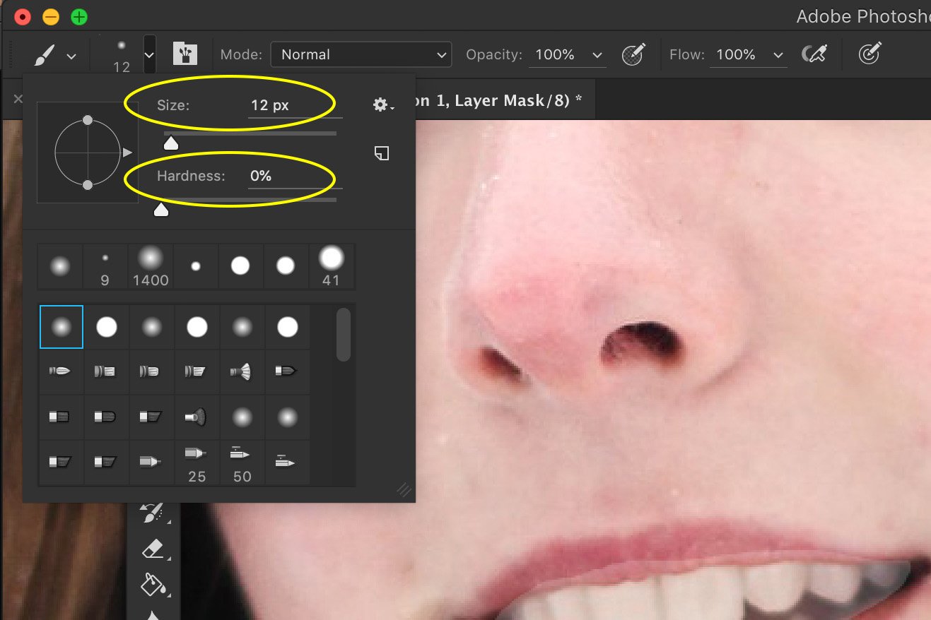 A screenhot of using brush tool to make teeth white photoshop