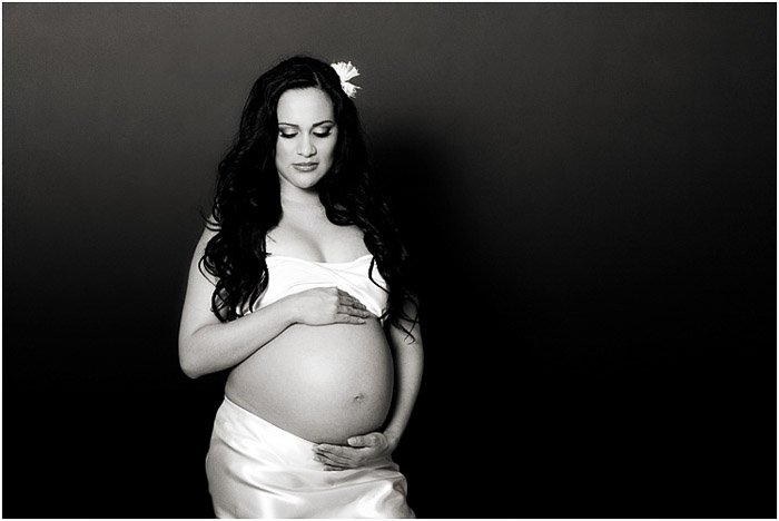 A beautiful black and white maternity portrait shot in the studio - people photography