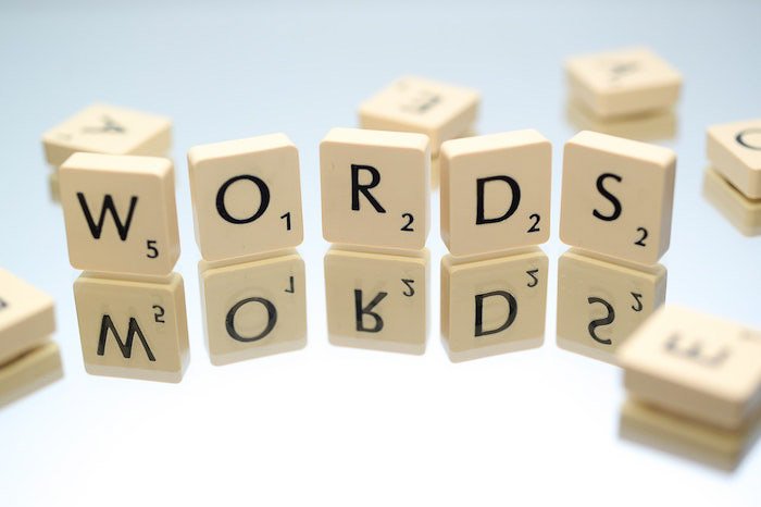 Scrabble pieces spelling 'words'