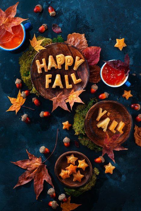 Creative food flat lay including cookies , fall leaves and food typography 