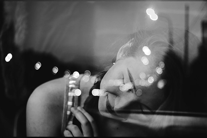 Film noir photography portrait of the female model in monochrome