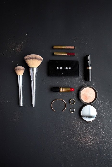 Flatlay product photography businesst shot of cosmetics on the dark background 