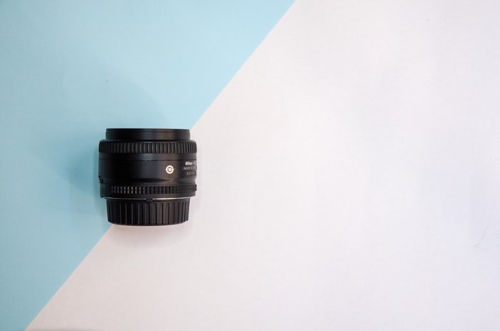 Zoom lens on the pastel background