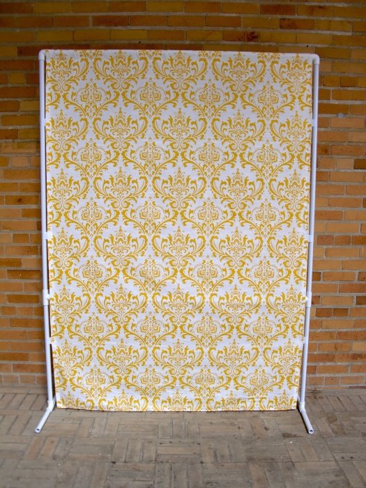 A DIY backdrop stand with patterned backdrop fabric