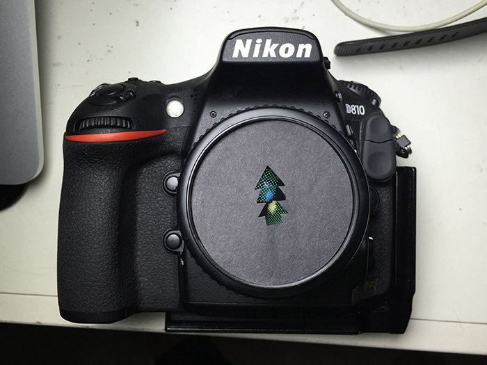 фото фотоаппарата Nikon с фильтром боке