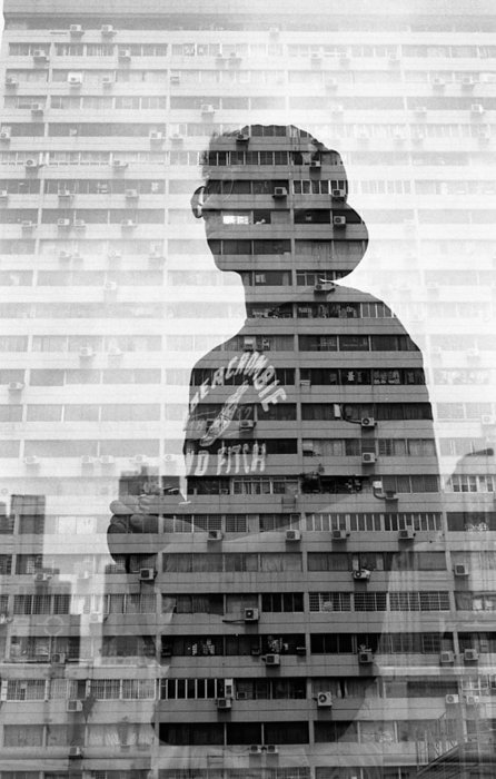 портрет человека и многоэтажного здания с двойной экспозицией